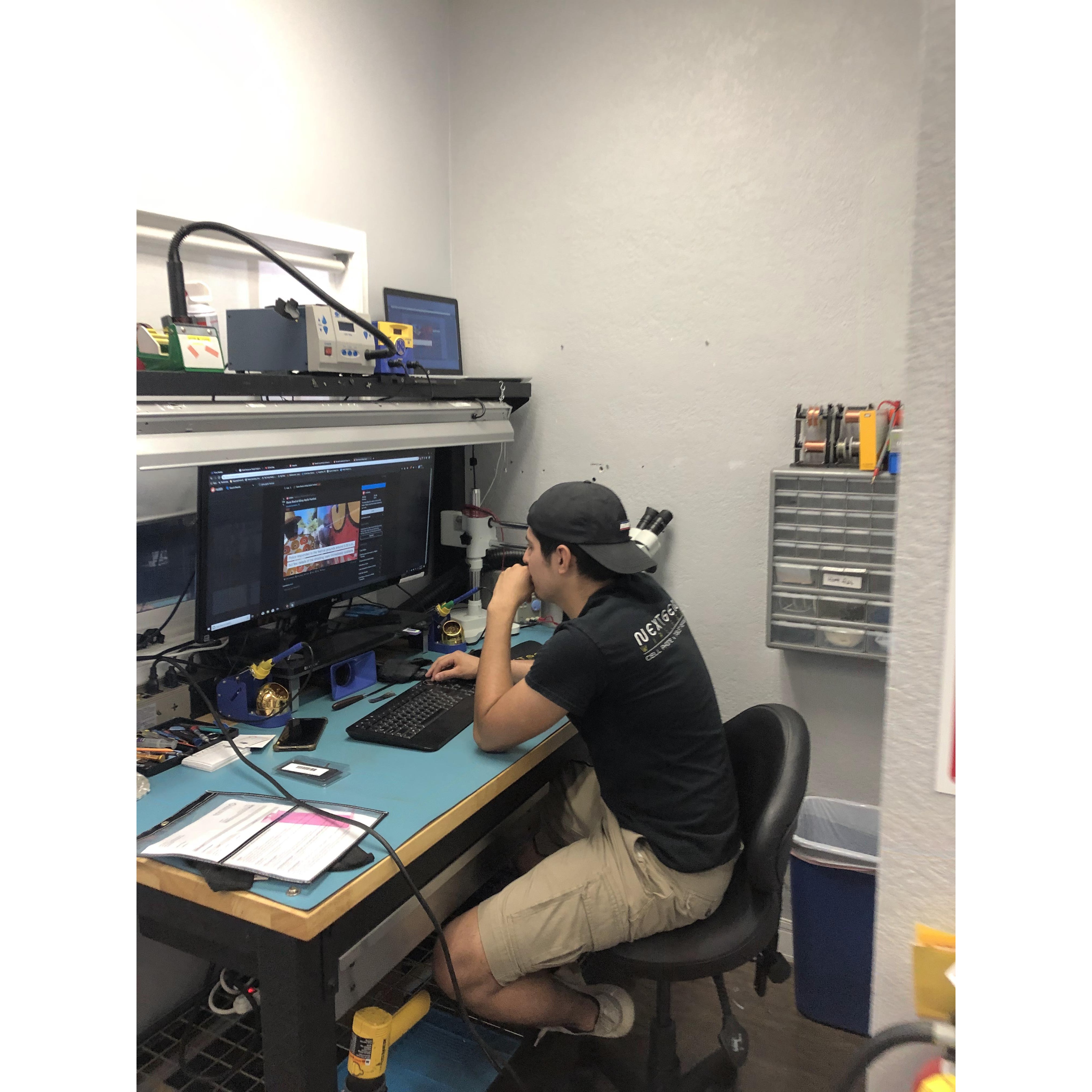 One of our technicians working on some devices.