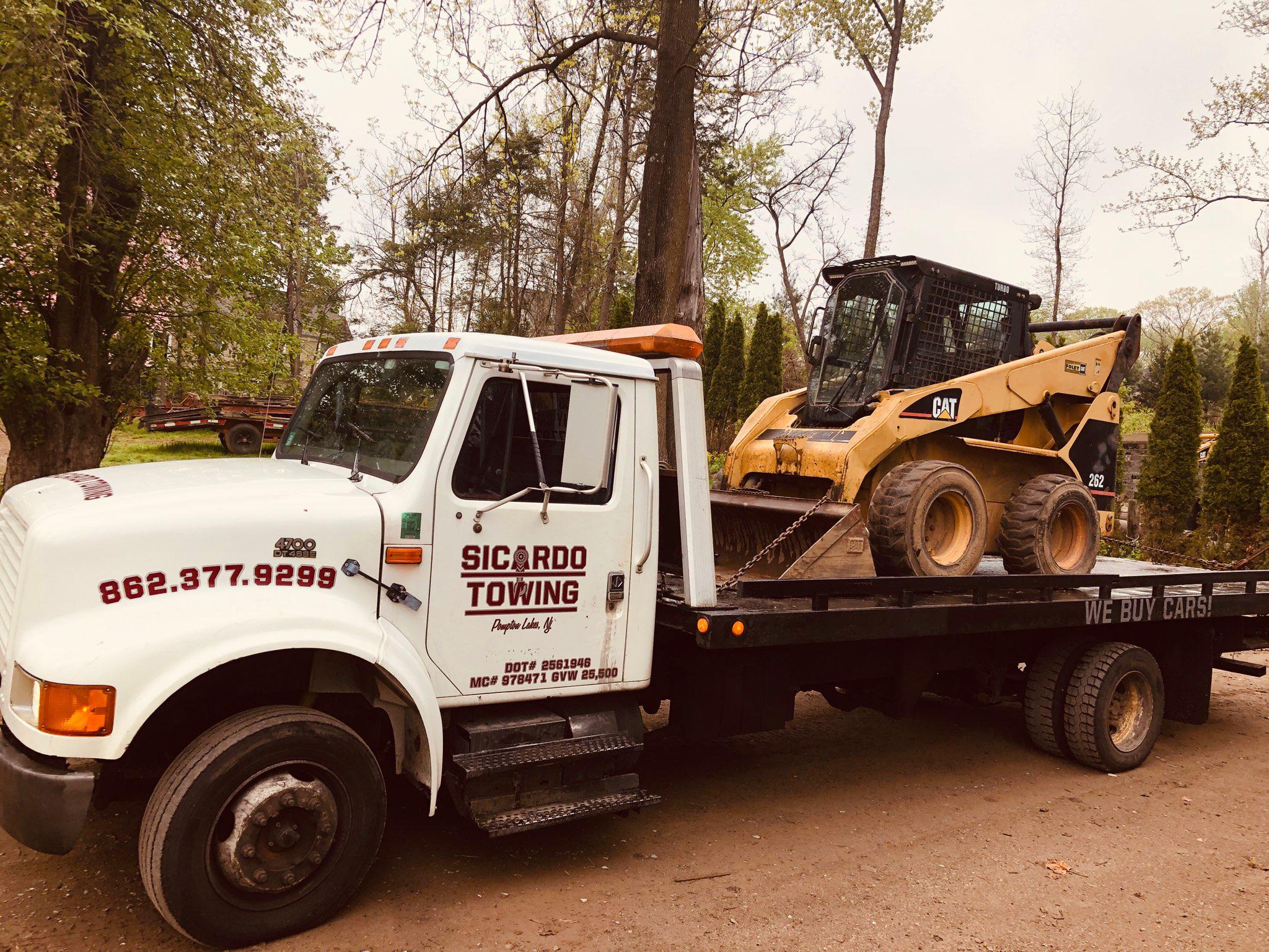 Need to tow some construction equipment? Our truck can handle large and small tows!