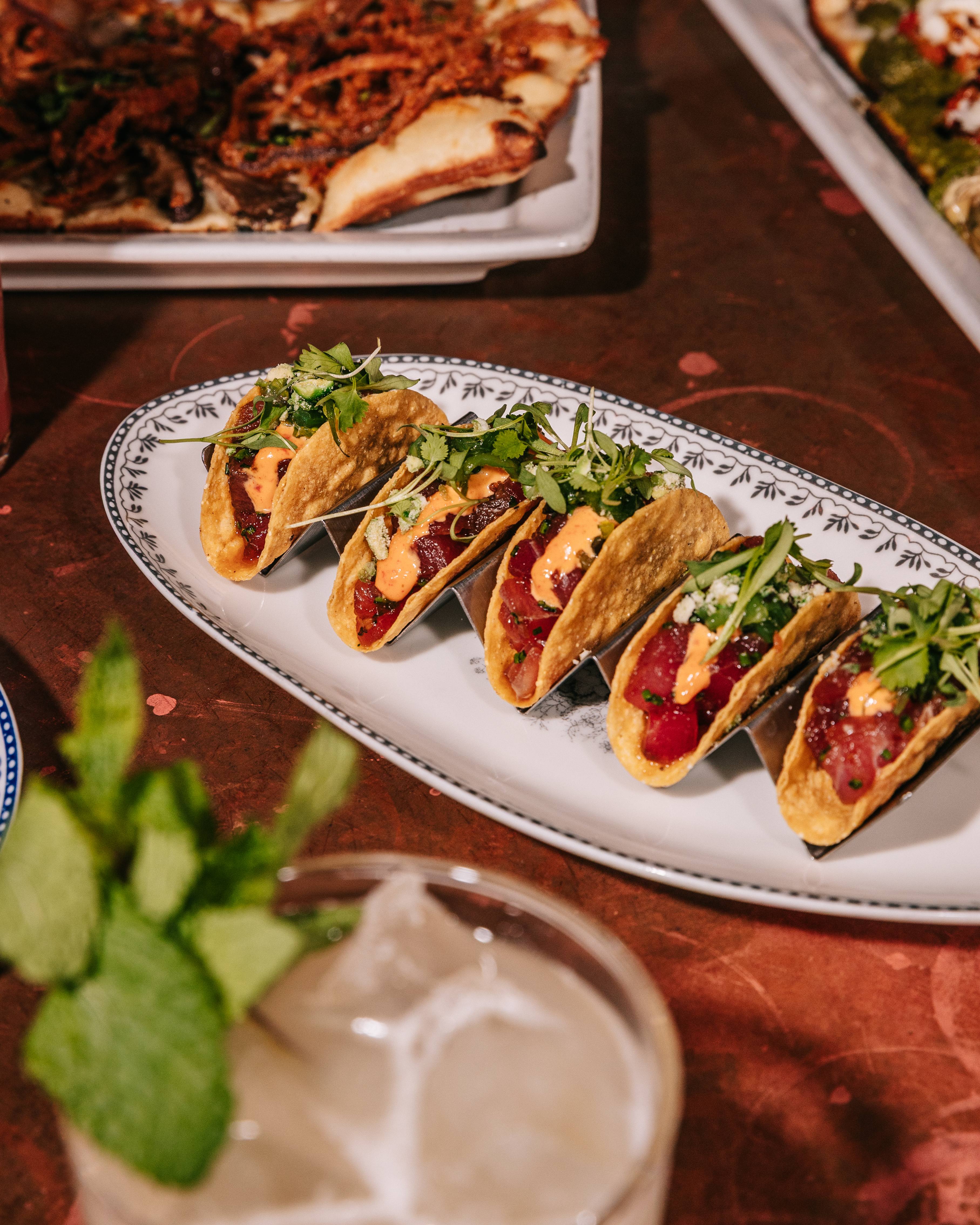 At Flight Club, social darts take center stage alongside craft cocktails, shareable bites, and an energetic atmosphere made for groups.