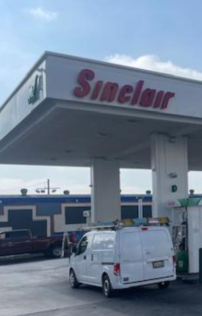Sinclair gas station fueling island