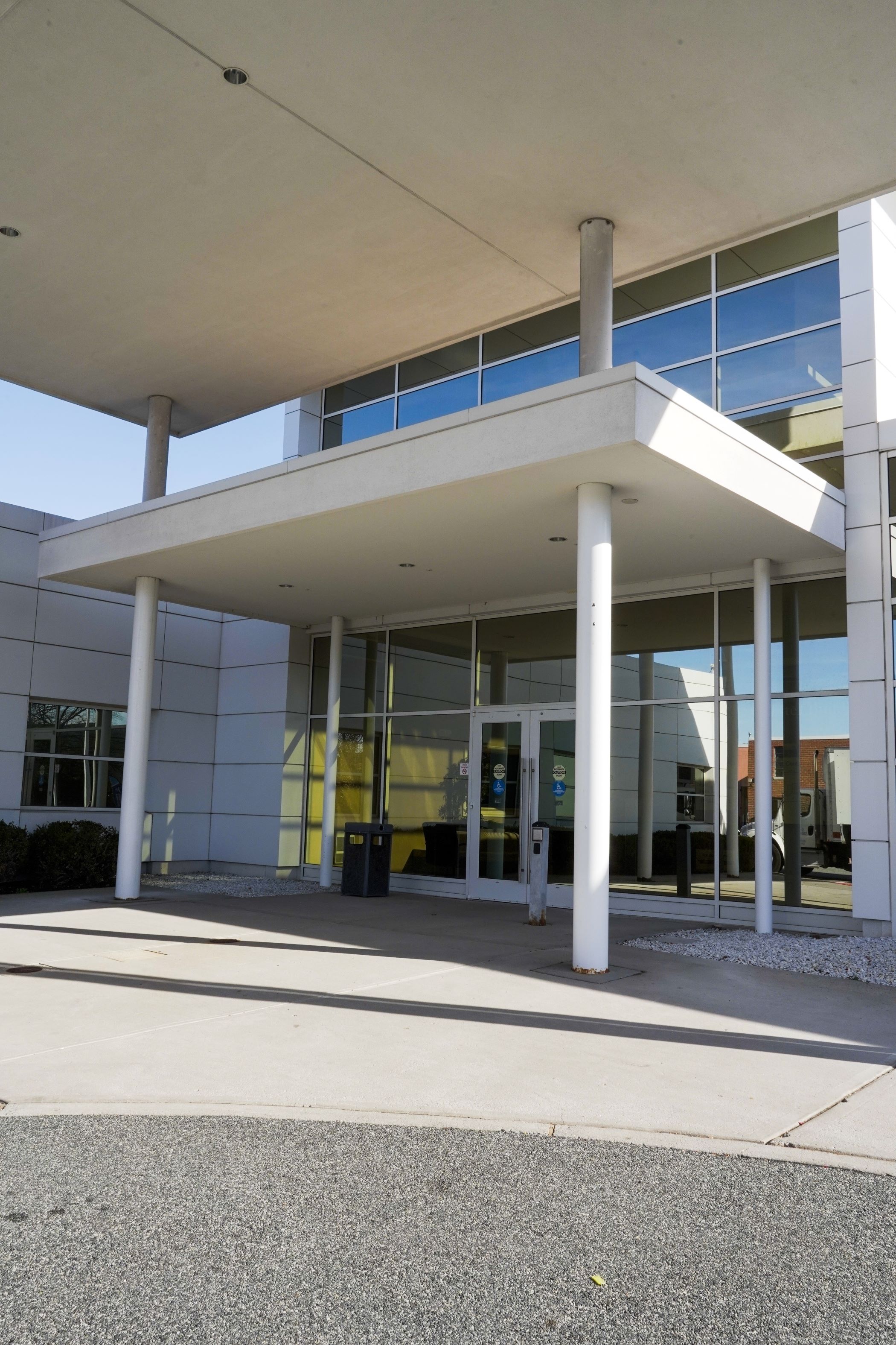 New Century Spine and Outpatient Surgical Institute's front door.