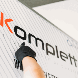 Komplett Società Cooperativa Logo