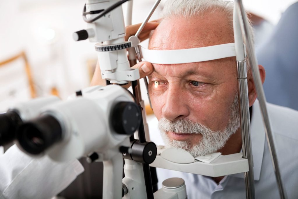 Man getting comprehensive eye exam to check for glaucoma