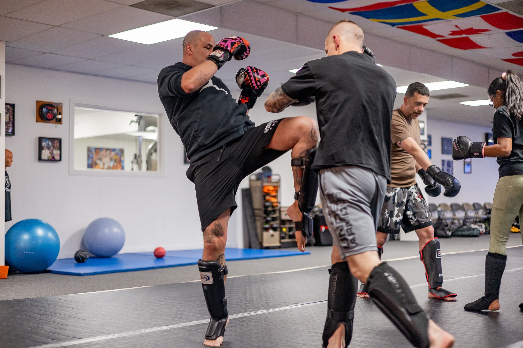 Kickboxing class focused on Muay Thai and Dutch-style striking, where students practice footwork, combos, and controlled sparring in a safe and structured environment for all levels.