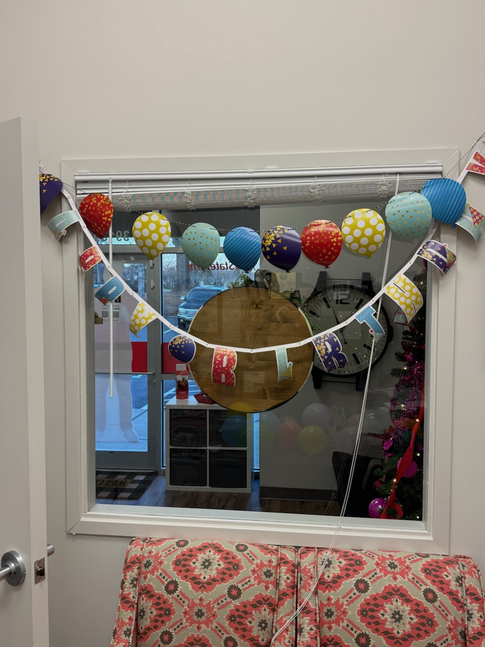 The team did not stop at the desk. They decorated the entire office for John's birthday, right down to the window. This is what it means to be part of the John Moody State Farm family.