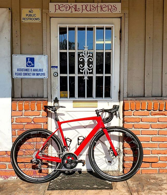 Pedal Pushing Bicycle Shop Photo