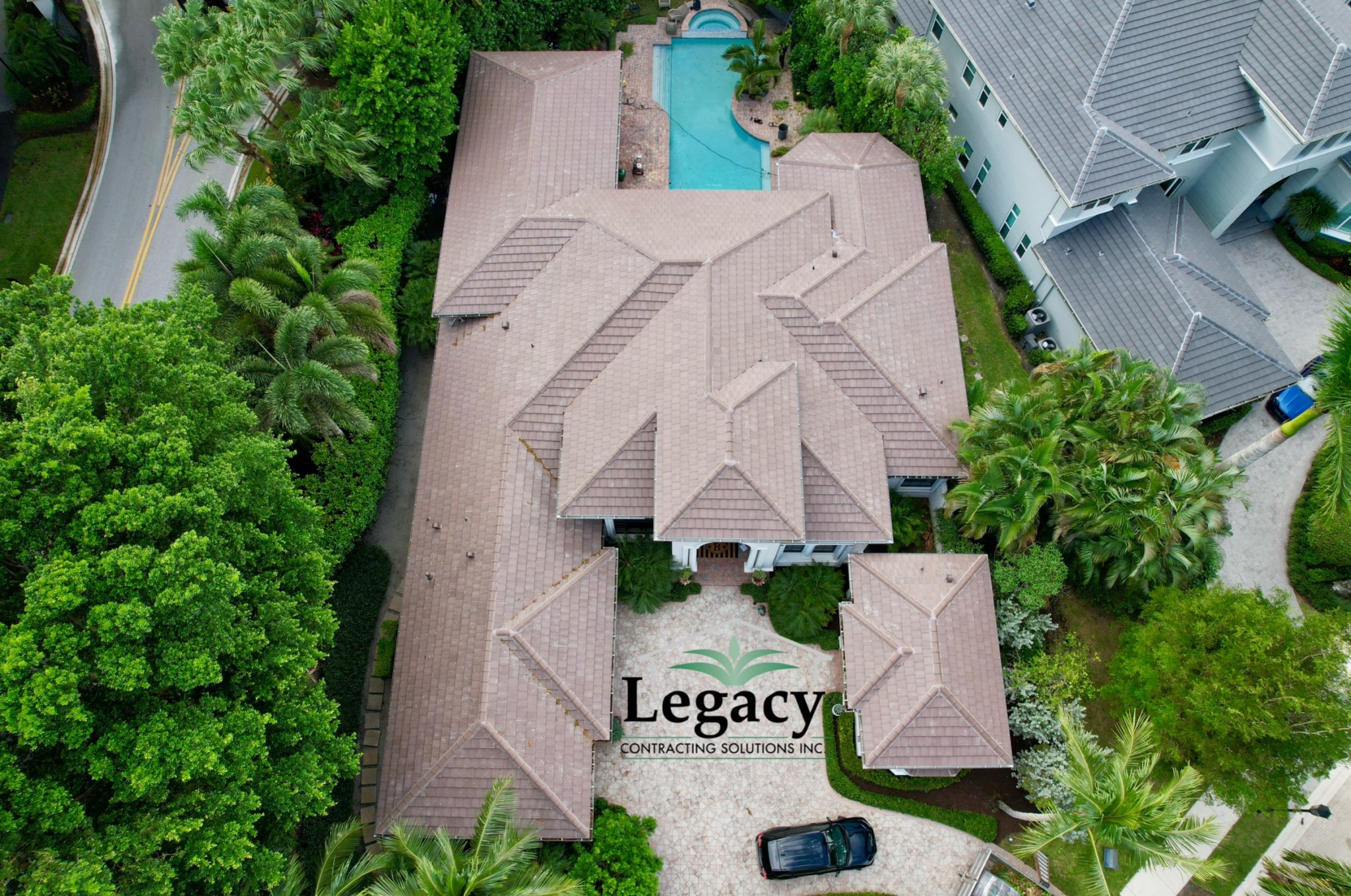 We replaced this roof with a flat tile from Eagle. This tile color is called Cocoa Range.