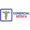Comercial Médica Logo