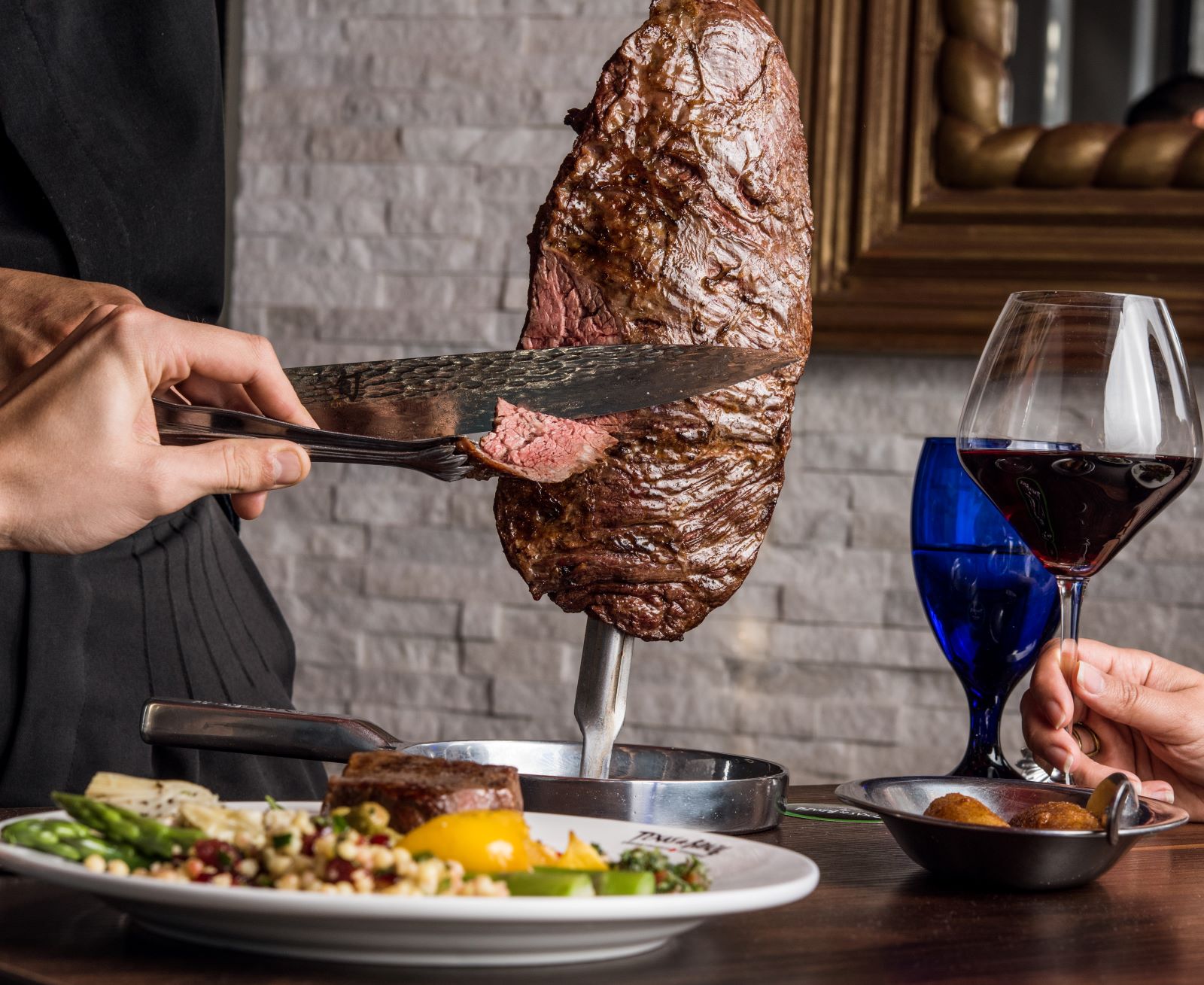 Enjoy continuous servings of meat, carved table-side by the restaurant gauchos.