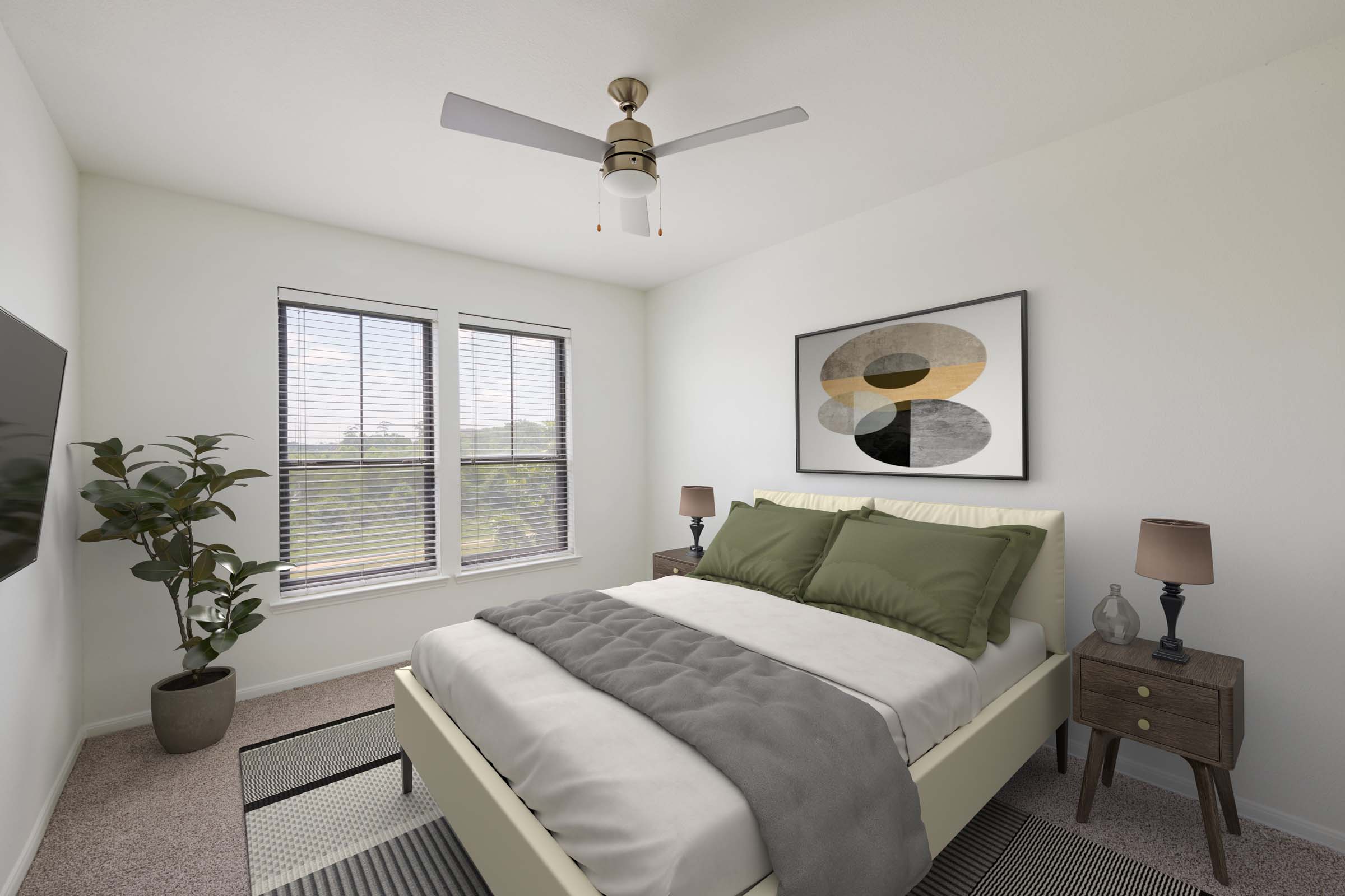 Bedroom with a lighted ceiling fan at Camden Heights apartments in Houston, TX
