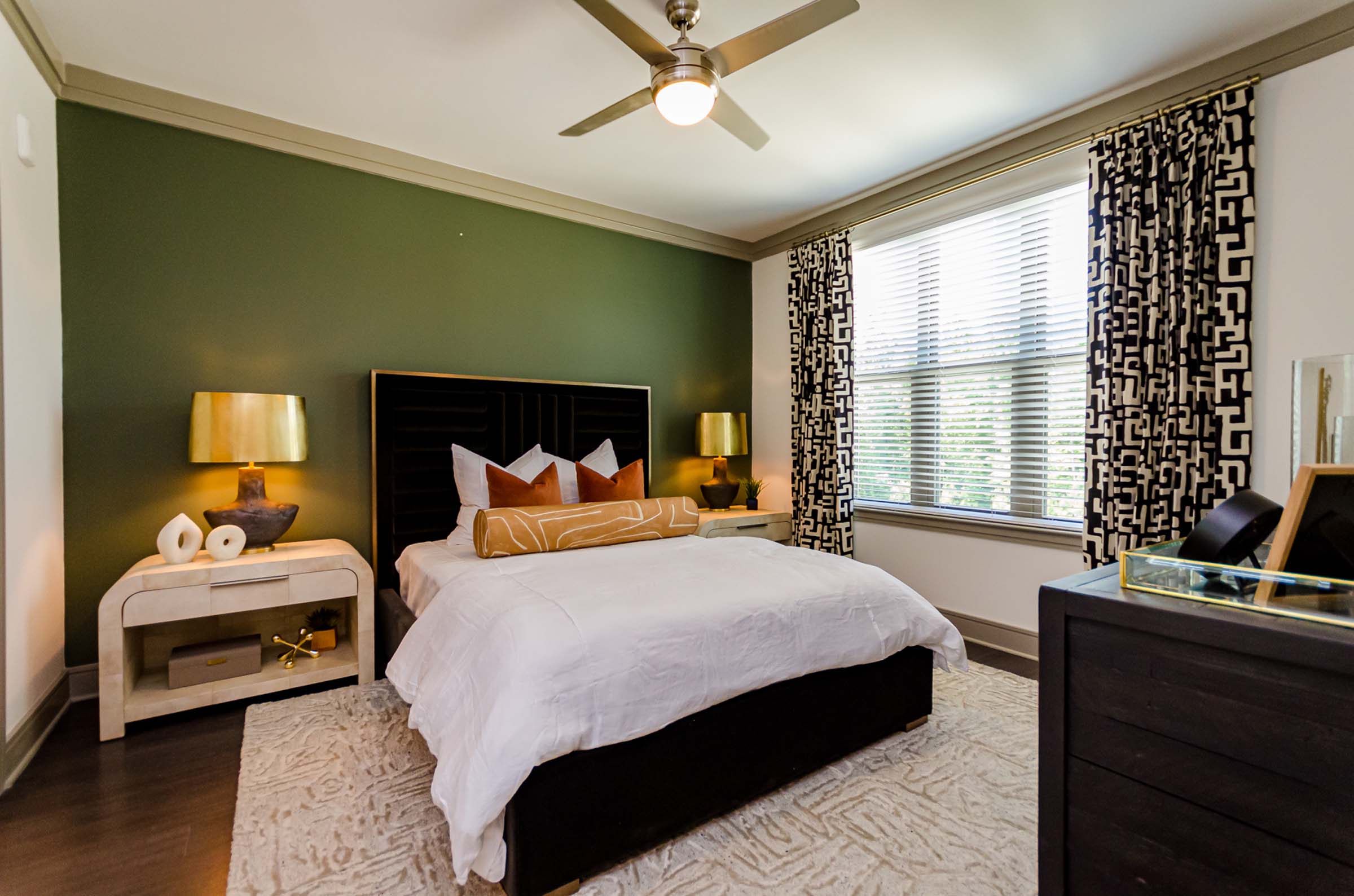 Primary bedroom at Camden Alpharetta apartments in Alpharetta, GA