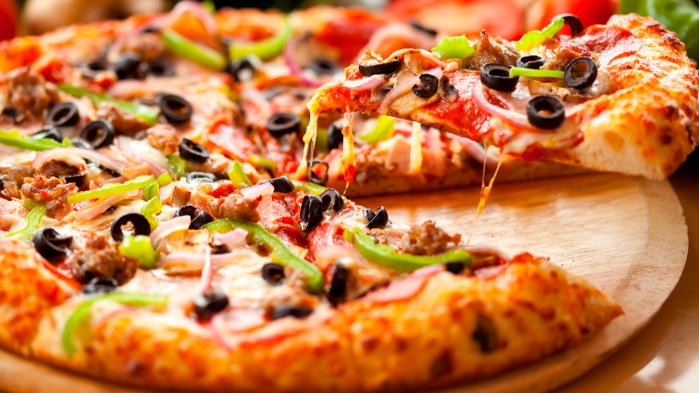 Hand tossed Outer Banks Pizzas available for take out in Kill Devil Hills.