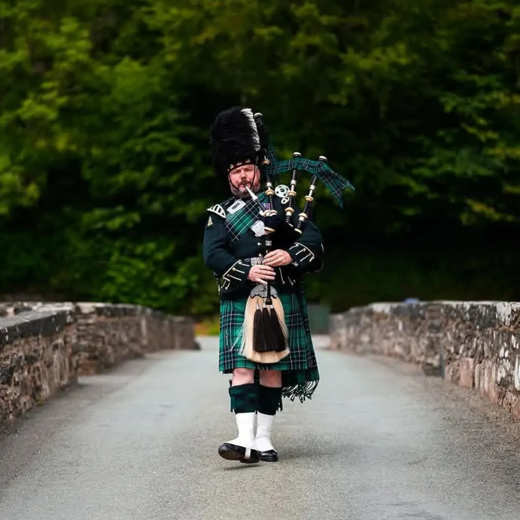 Images Andrew Paton Highland Bagpiper