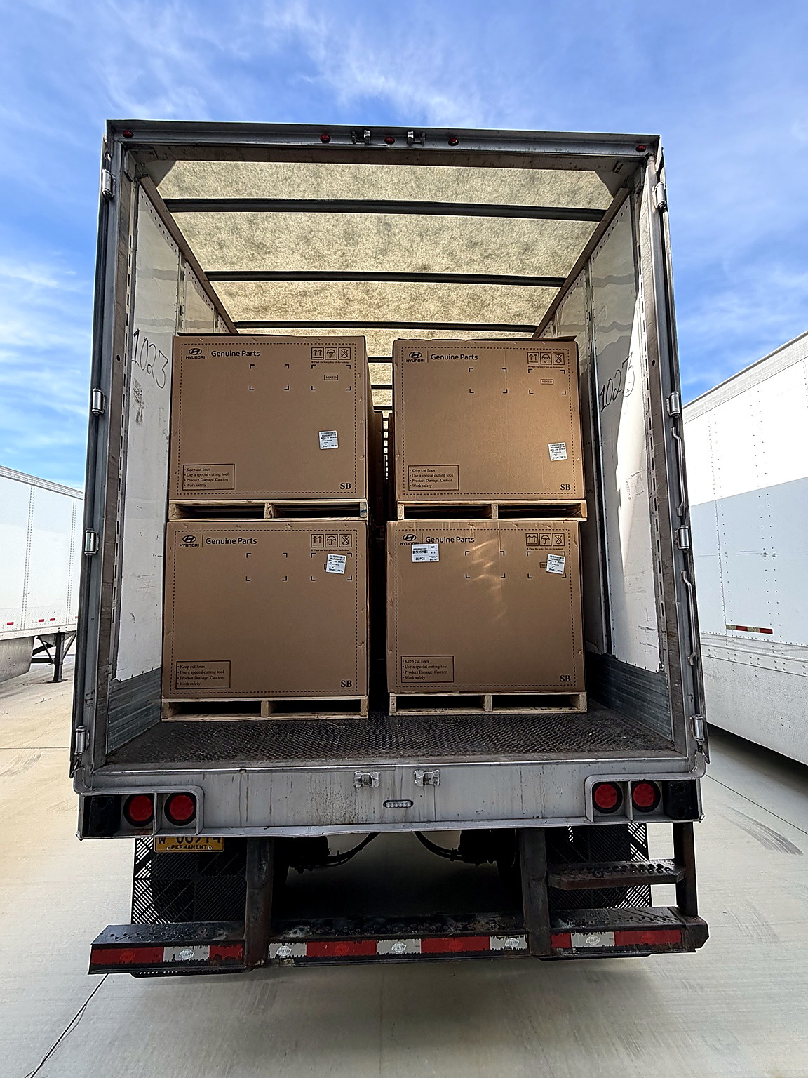 AeroLuxe Ground Inc. dry van freight shipment featuring palletized Hyundai Genuine Parts loaded insi 