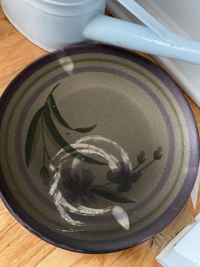 Blackened plate following fire