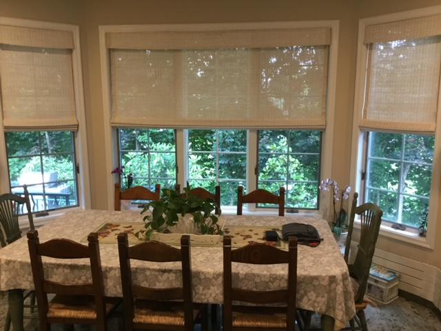 Get perfectly filtered light in your dining room. We love how these Woven Wood Shades look in this elegant Pleasantville, NY, home. Great job, team! #BudgetBlindsOssining #PleasantvilleNY #WovenWoodShades #NaturalShades #FreeConsultation #WindowWednesday