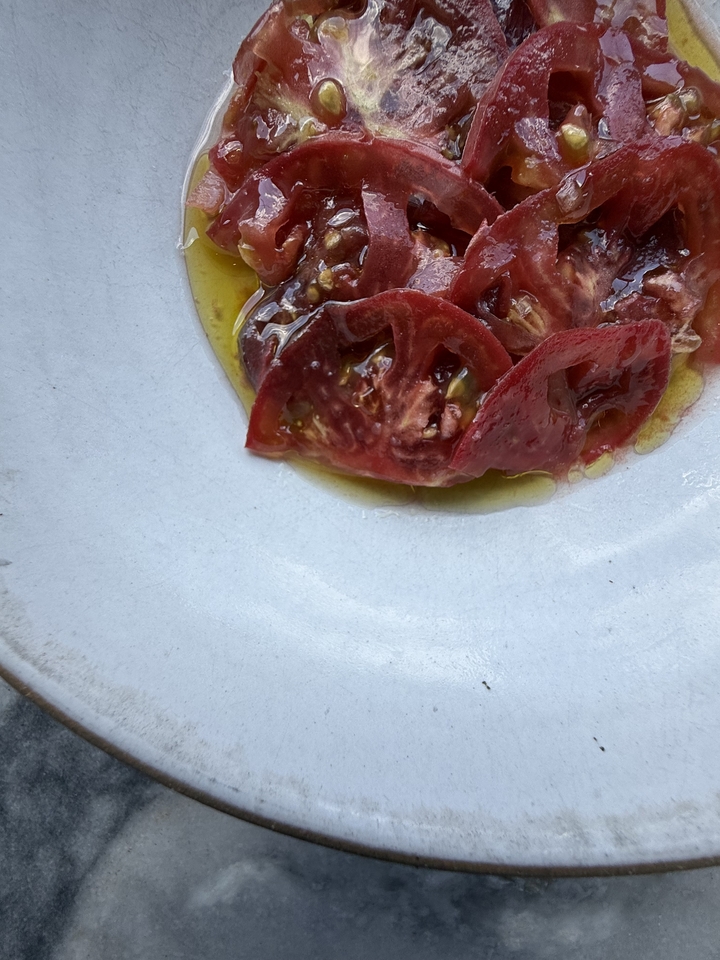 A seasonal heirloom tomato dish, simply dressed, at Folk in East Nashville. 
