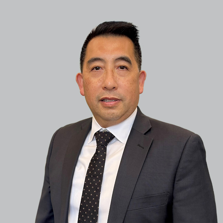 Headshot of Andy Au, a wealth advisor at Chase