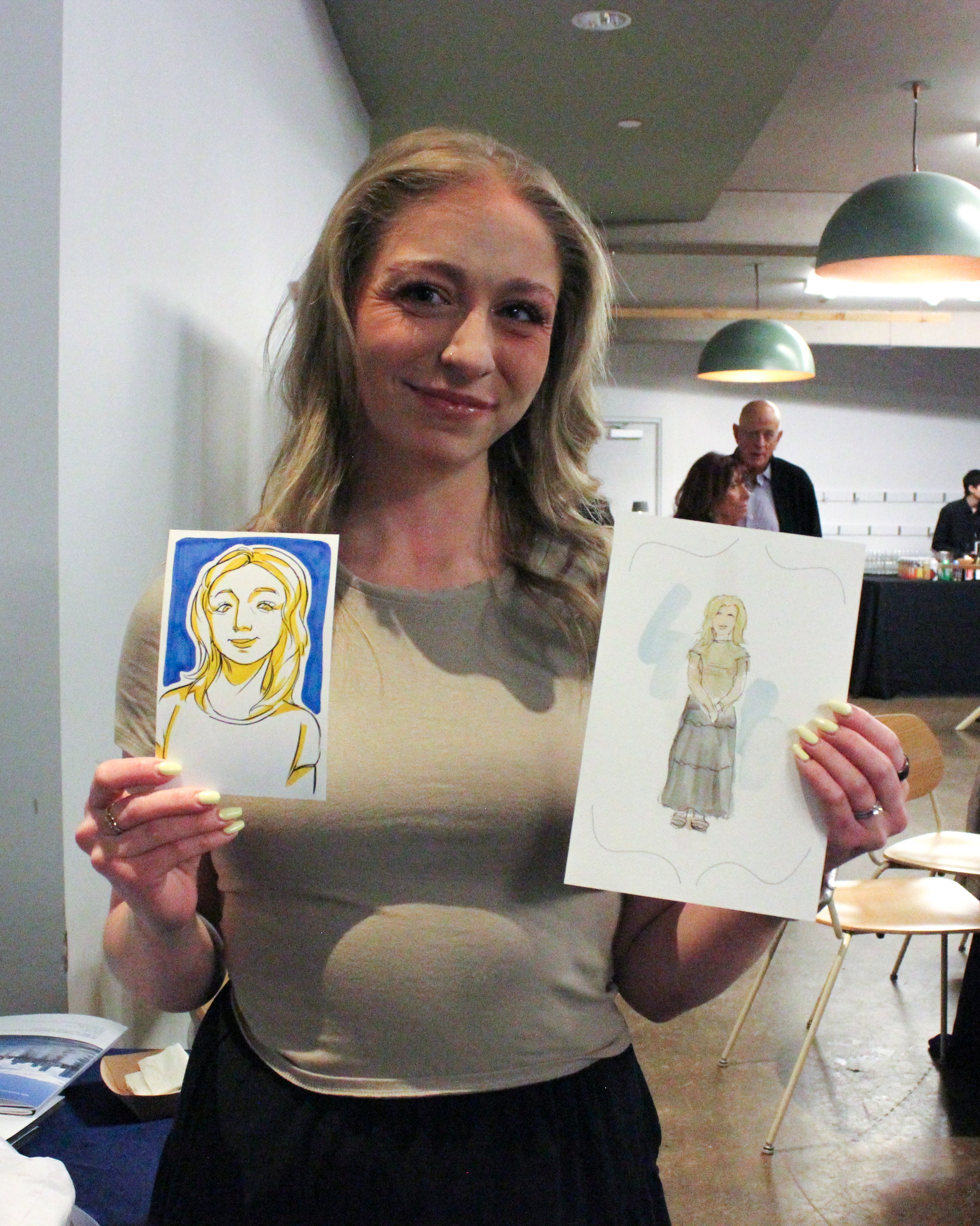 alyssa holding art cropped.jpg