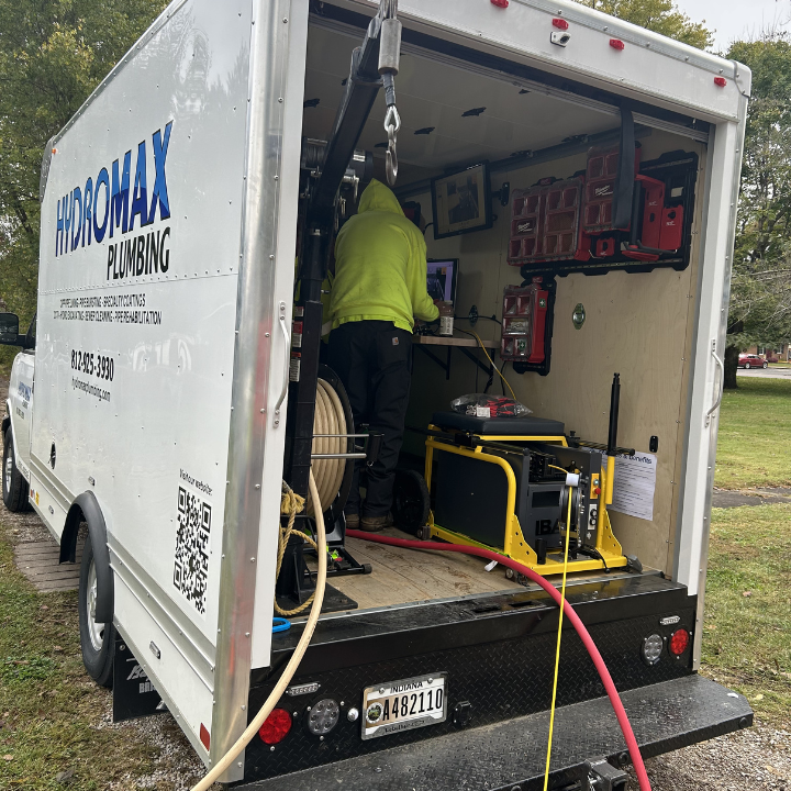 A Hydromax technician works from a fully equipped service truck on a customer call. Our fleet arrives stocked to diagnose and fix plumbing, drain, and sewer problems in one visit throughout the Evansville tri-state area.
