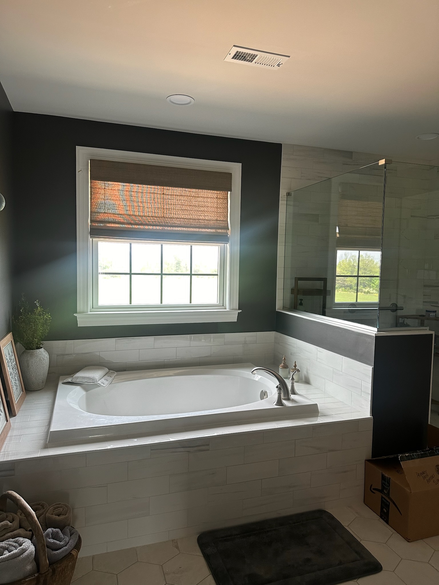 Woven wood shades turn your bathroom into a peaceful, tranquil space.