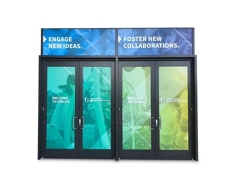 Door graphics for Stanford ChildX. Display graphics by PLC Print.