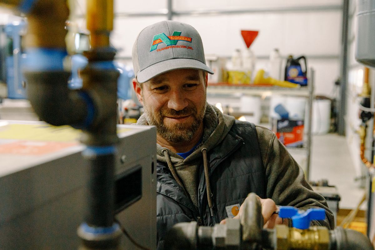 A Beaupre Fuels technician performing heating system service and maintenance in Southern Maine. Beaupre Fuels provides expert HVAC repair, boiler maintenance, furnace installation, and dependable heating solutions for residential and commercial customers.