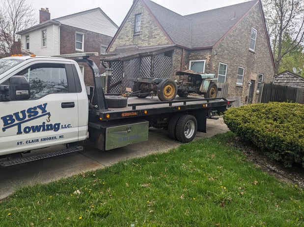 Images Busy Towing LLC