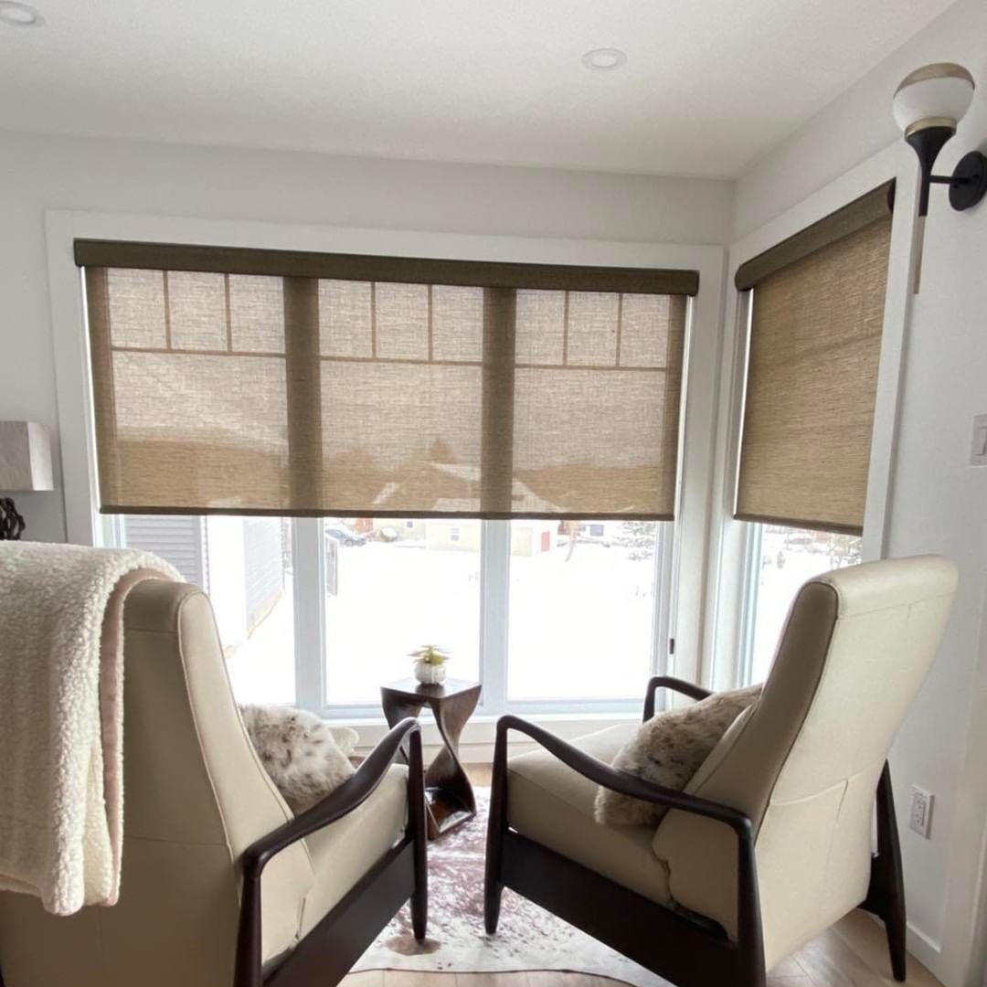 These roller shades seamlessly match with the flooring and furniture, creating a cohesive look throu Budget Blinds of Port Perry Blackstock (905)213-2583