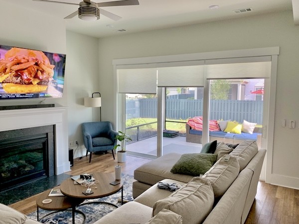 Watch your favorite bowl games without any distractions this winter! Our advanced motorized roller shades create the perfect space to host watch parties to cheer on your favorite teams, just like this local Hilton Head Island living room! Our sleek motorized shades can adjust natural light in your s