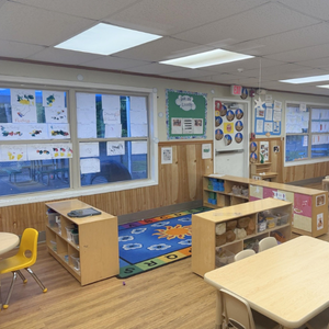 Bright and colorful preschool classroom at Childcare Network with age-appropriate learning materials 