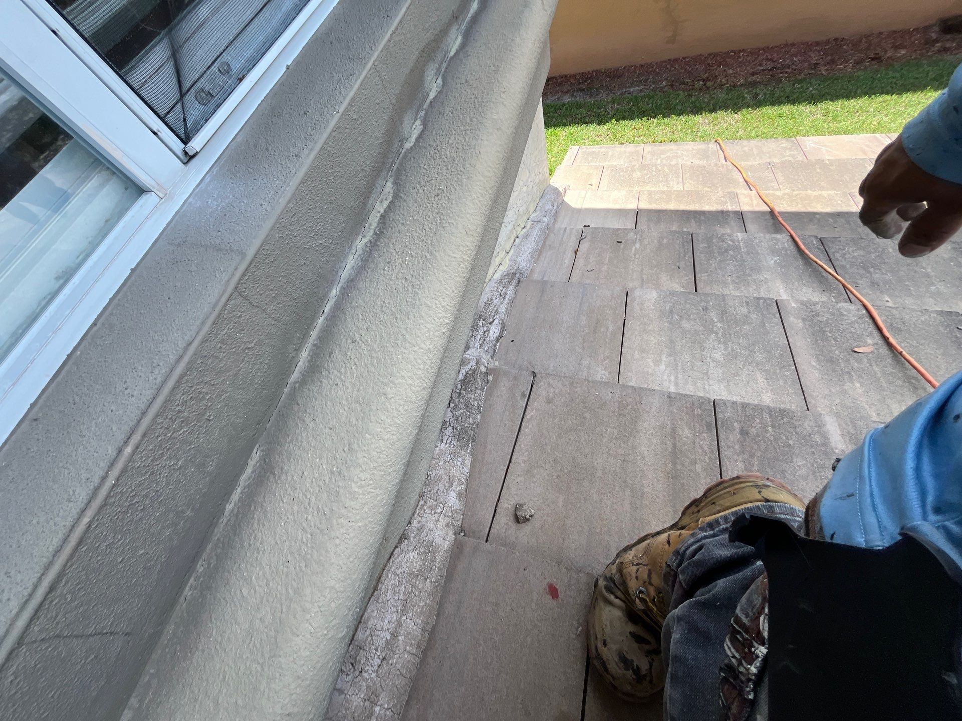 Close-up of the roof edge, fascia, and gutter area, showing an important transition point for proper 