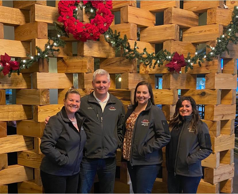 Celebration of 5 Years with team for Angela - December 2020 with team members from Left to Right: Melanie Redmond Mulholland, Wade Lester, Angela Reames, and Vivian Rowland