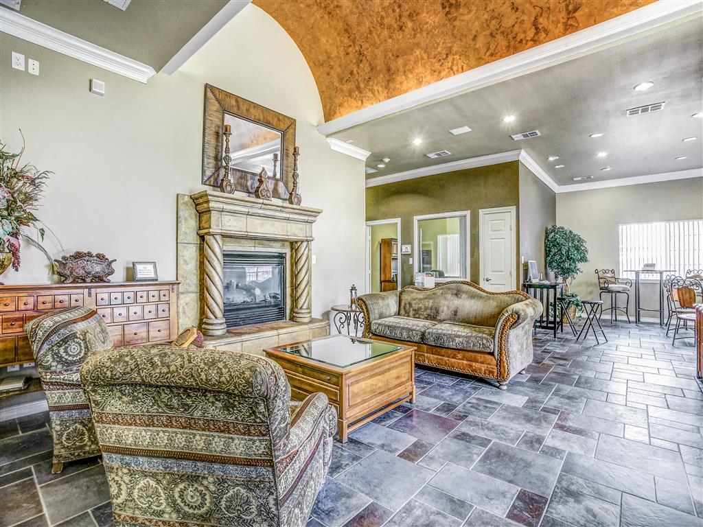 A living room with a stone floor