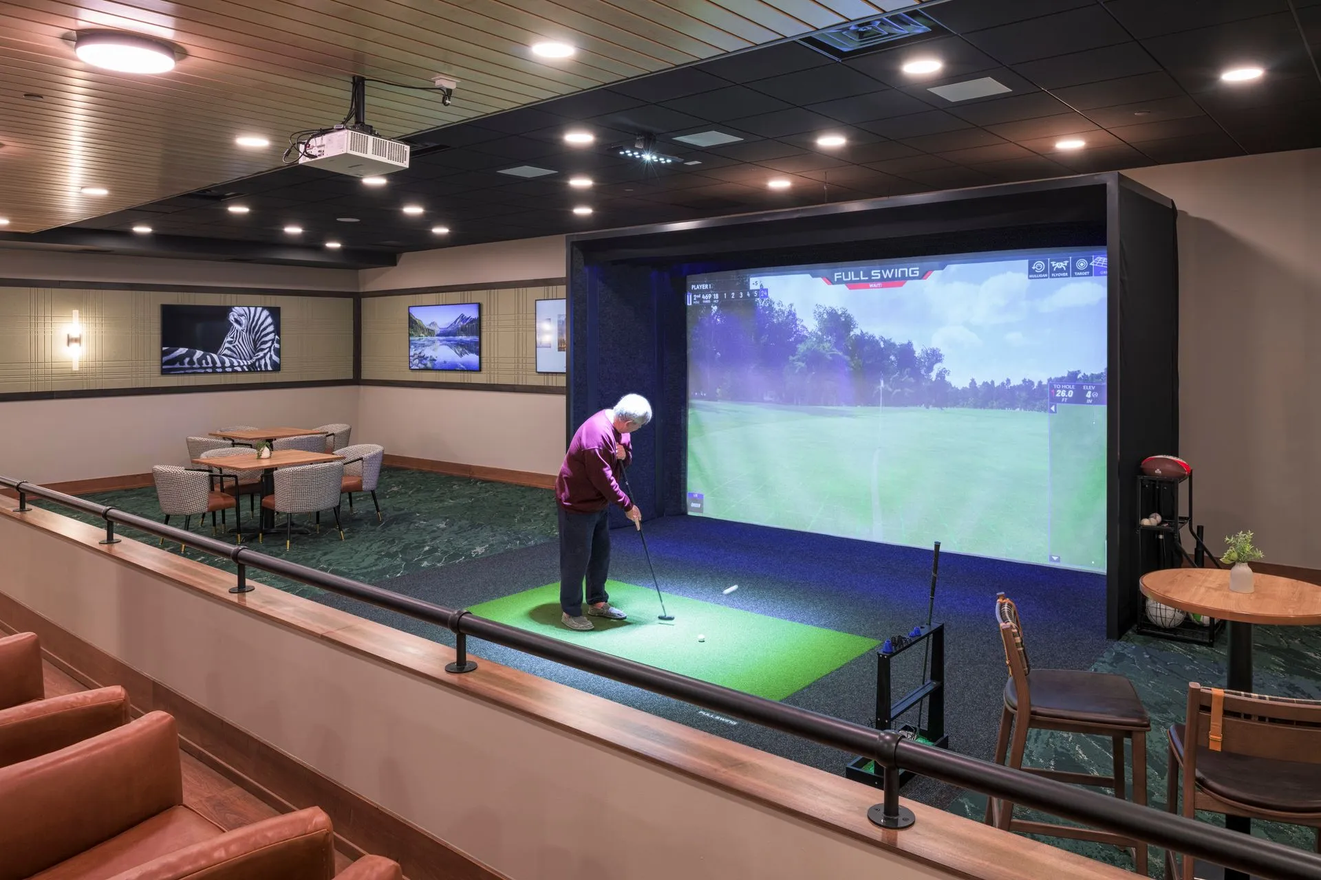 The golf simulator is one of the signature amenities at Corcoran.