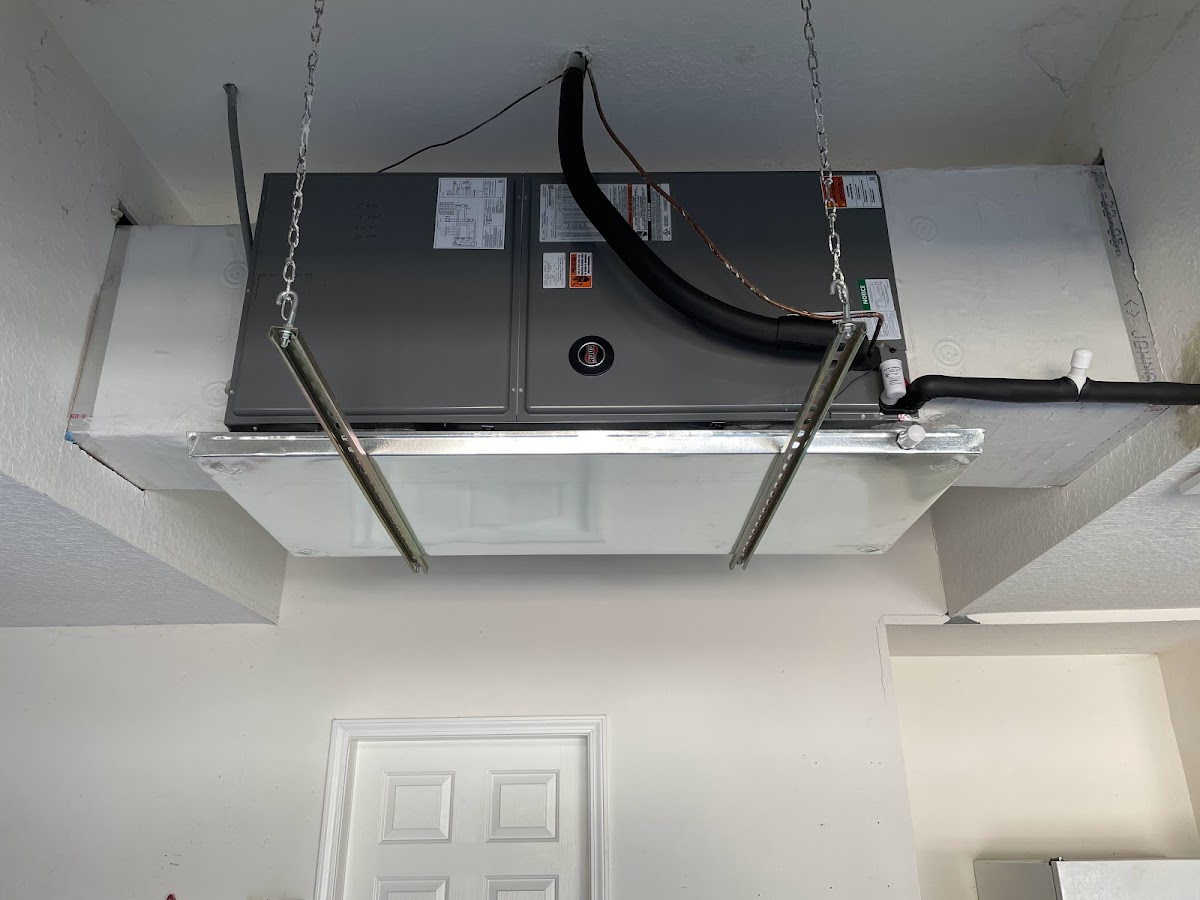 Indoor HVAC air handler and ductwork installation completed by M&R Air Conditioning to improve airflow, efficiency, and indoor comfort.