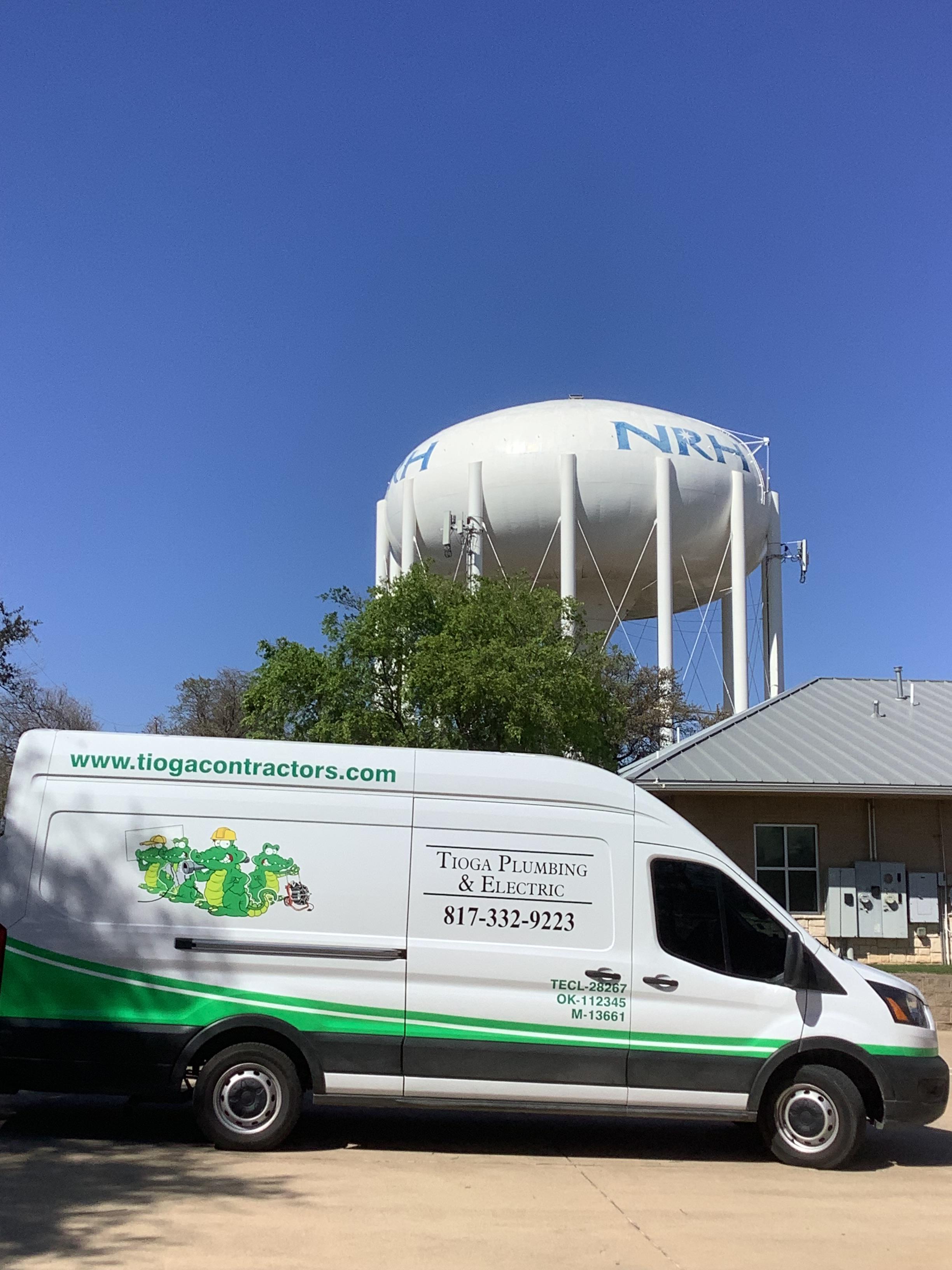 A Tioga service truck at the NRH water tower in North Richland Hills Texas.