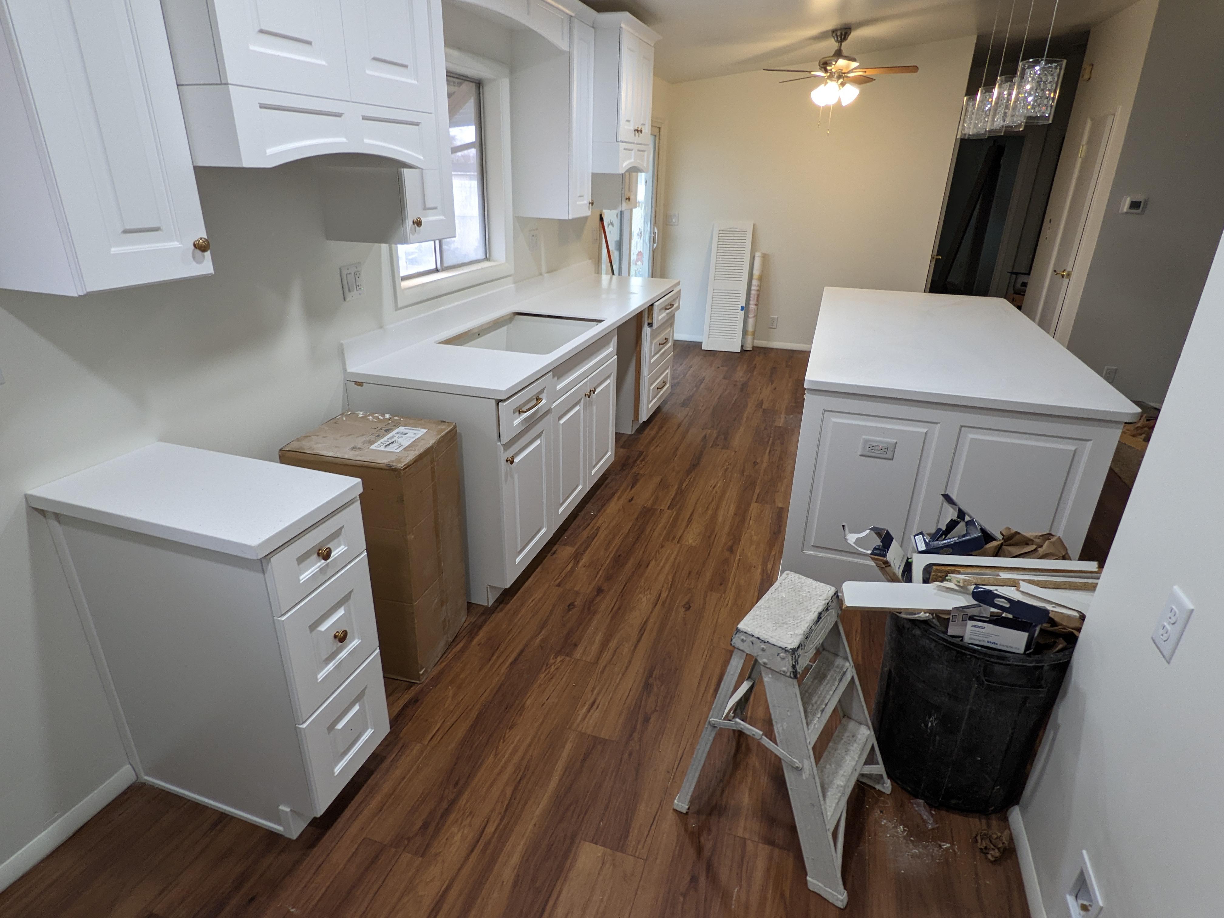 New kitchen cabinets being installed