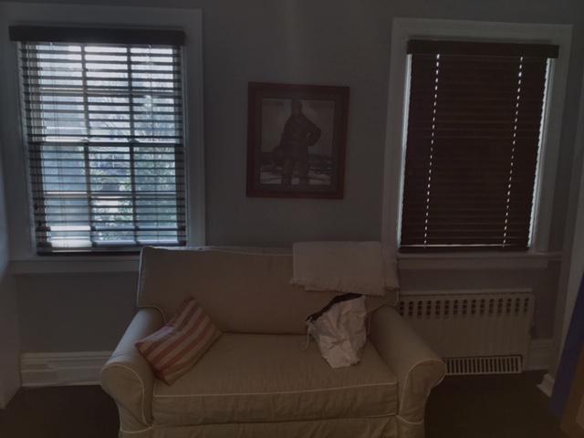 Who says blinds have to be white? Custom Wood Blinds like these, recently installed in Sleepy Hollow, NY, have a rich look that enhances the style of this vintage apartment but would look just as good in a modern setting. #BudgetBlindsOssining #WoodBlinds #BlindedByBeauty #FreeConsultation #SleepyHo