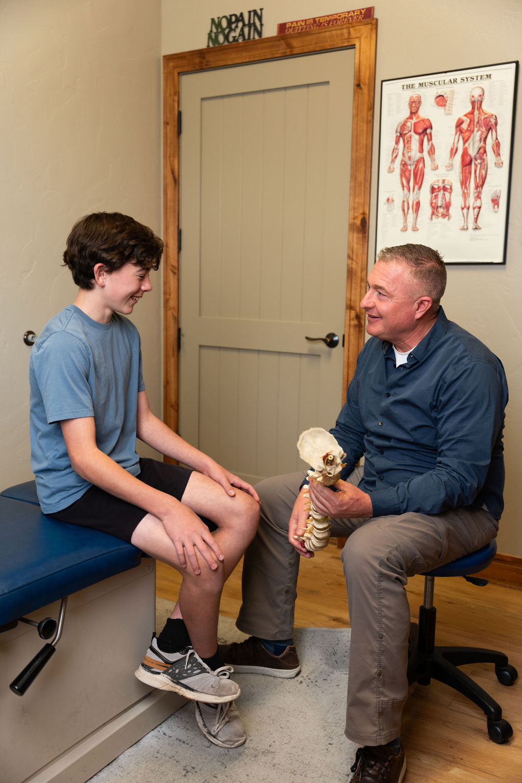 Chiropractor working with a patient