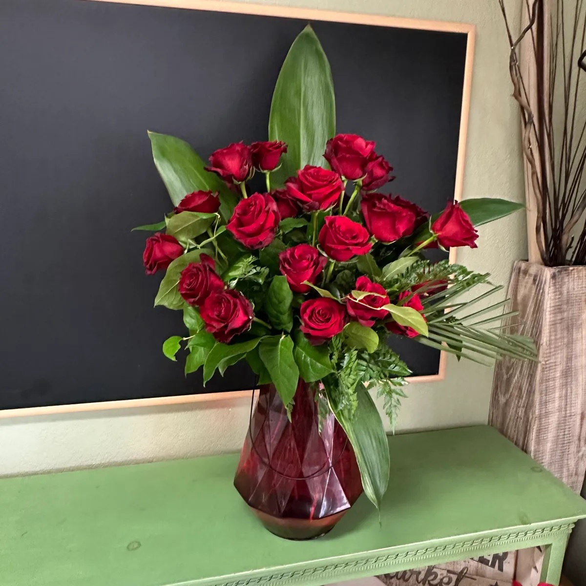 Jeweling - A Luxury sized arrangement designed with our Love N’ Bloom Epic Long Stem Red Roses in a high quality glass vessel.