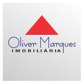 Oliver Marques Imobiliária Logo