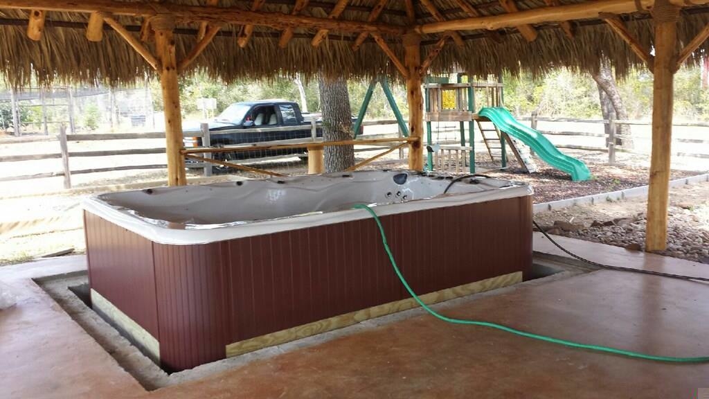 Check out the Party Pool Installation. Concrete slab recessed for the Party Pool and a Palapa over the area.