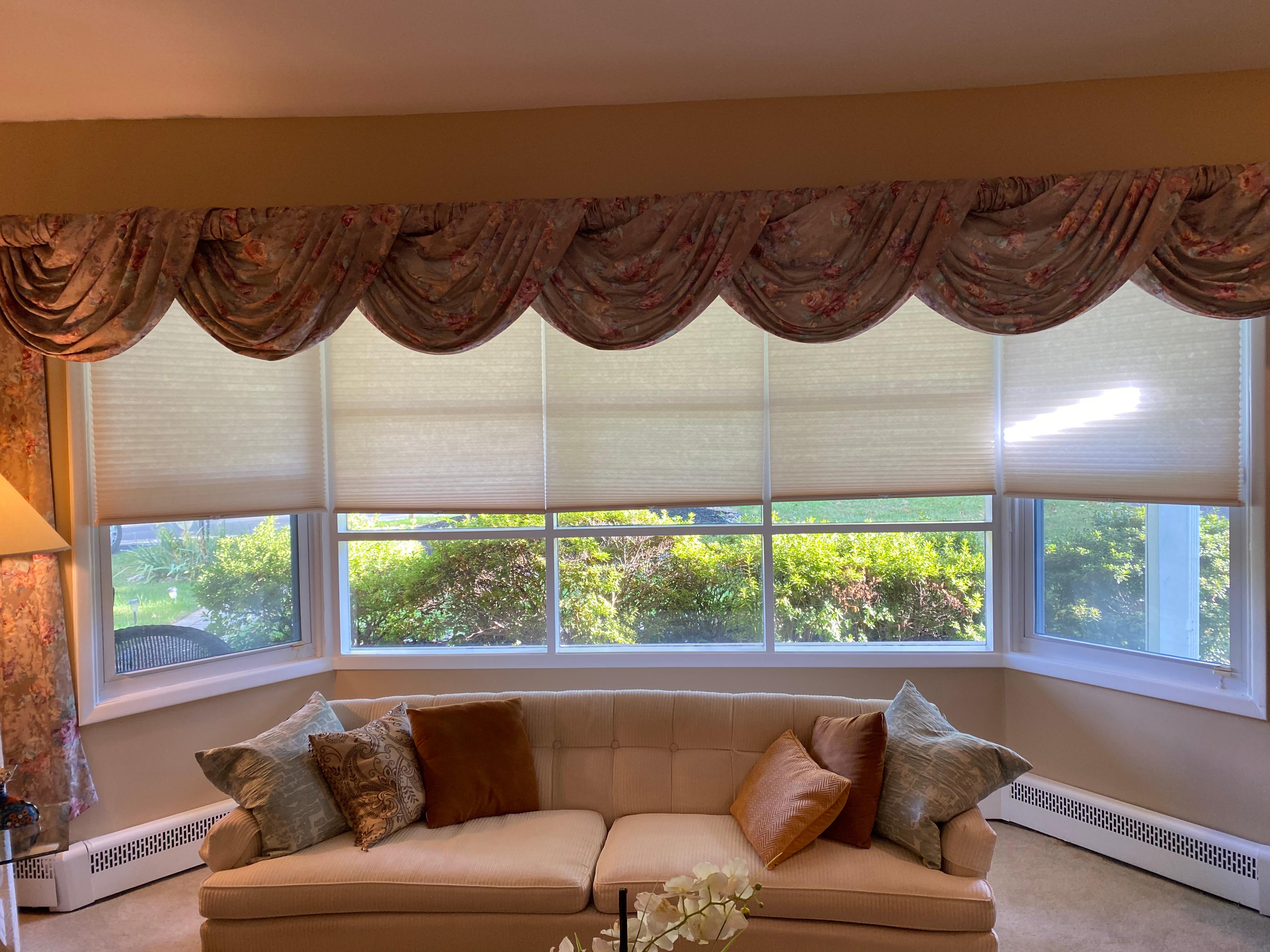 Valances custom made with beautiful fabrics make any window stand out.