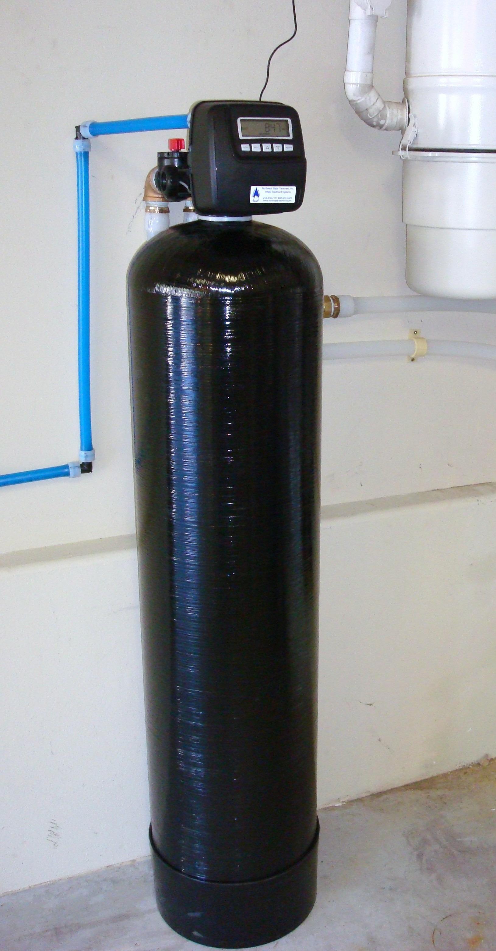 Whole house carbon filter for removing chlorine from all home water - faucets and bathing.