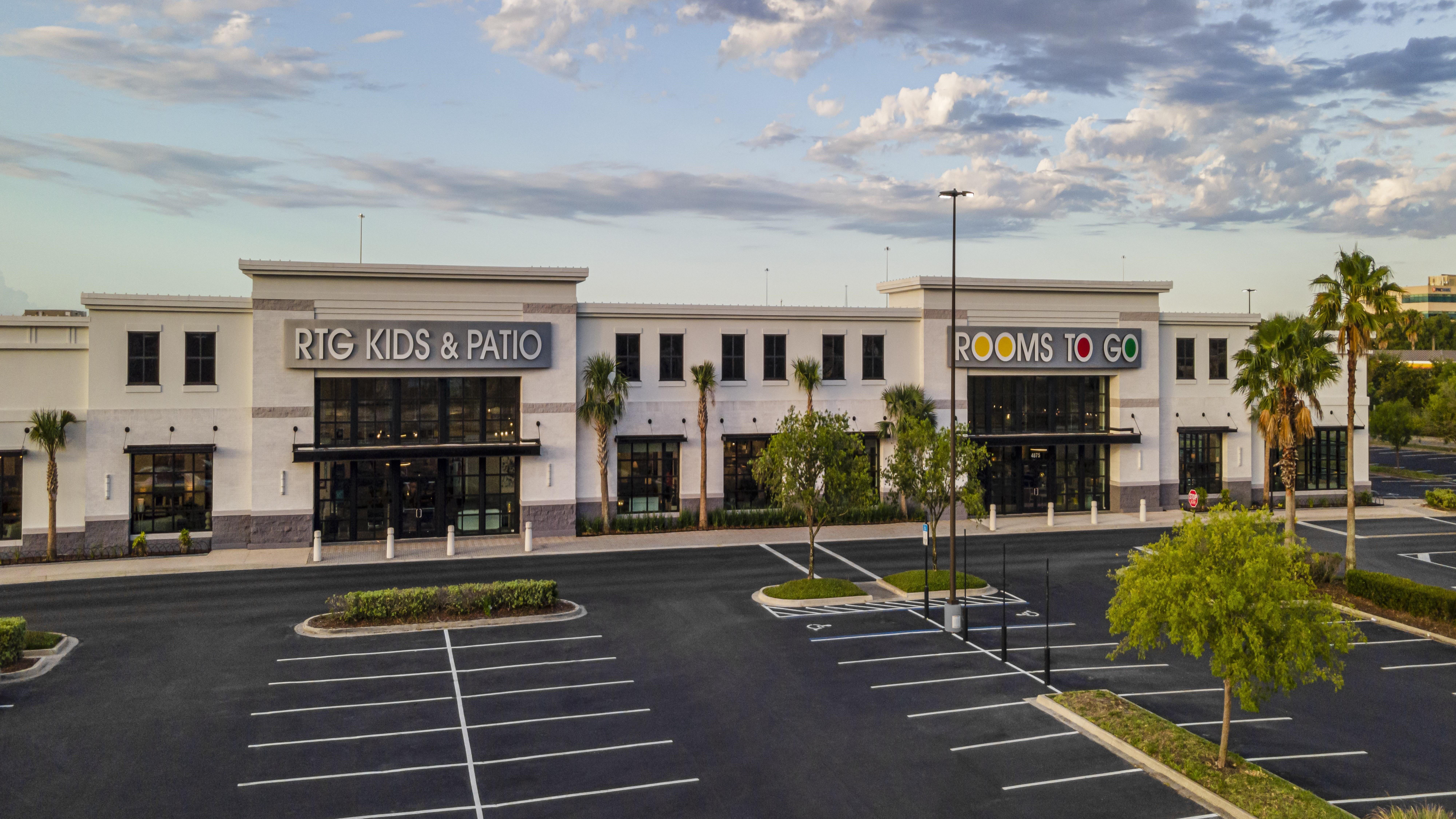 Front view of RTG Kids & Patio showroom with spacious parking lot.