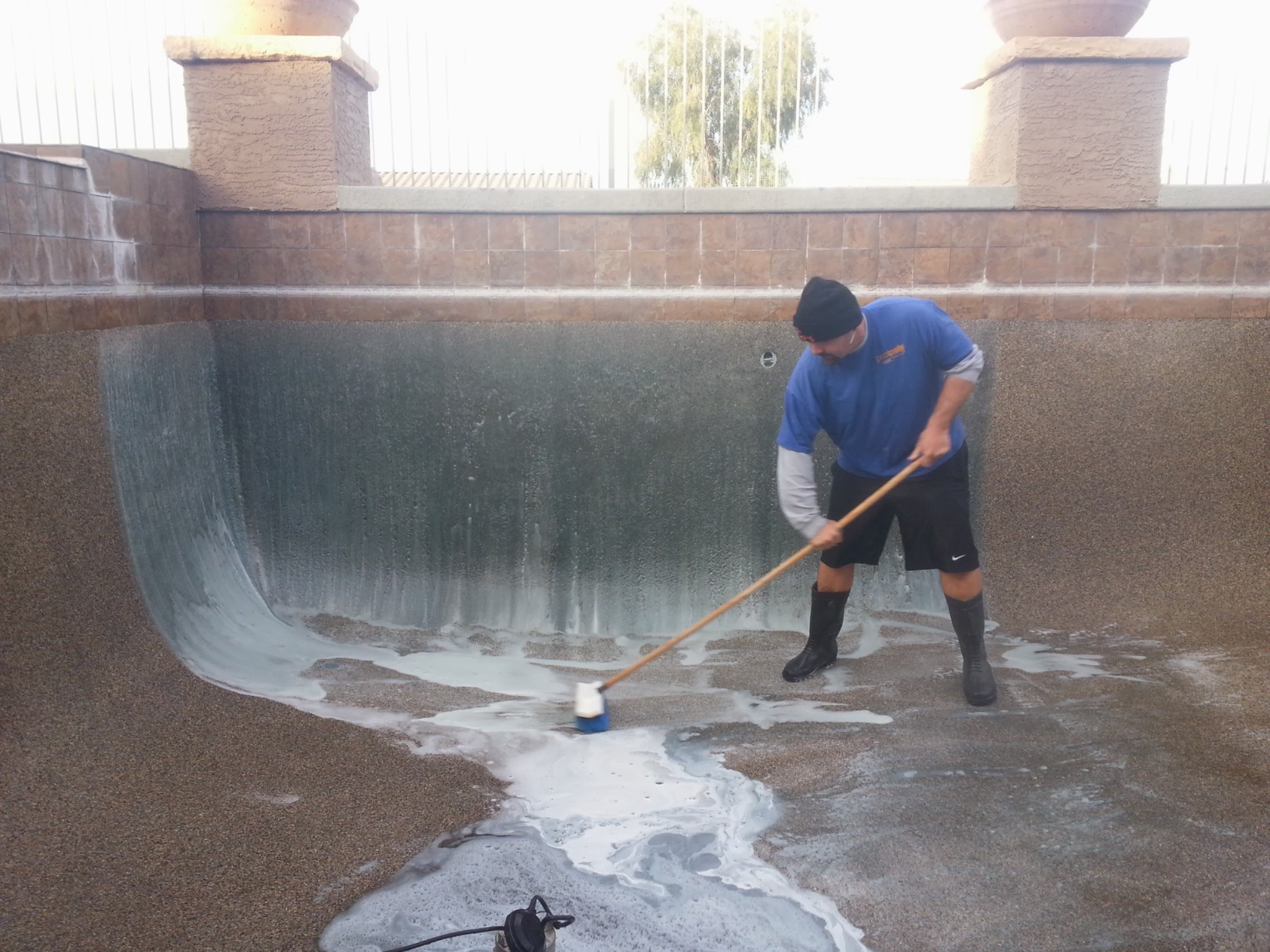 Professional pool maintenance sometimes requires more than routine cleaning. This photo documents Aq 