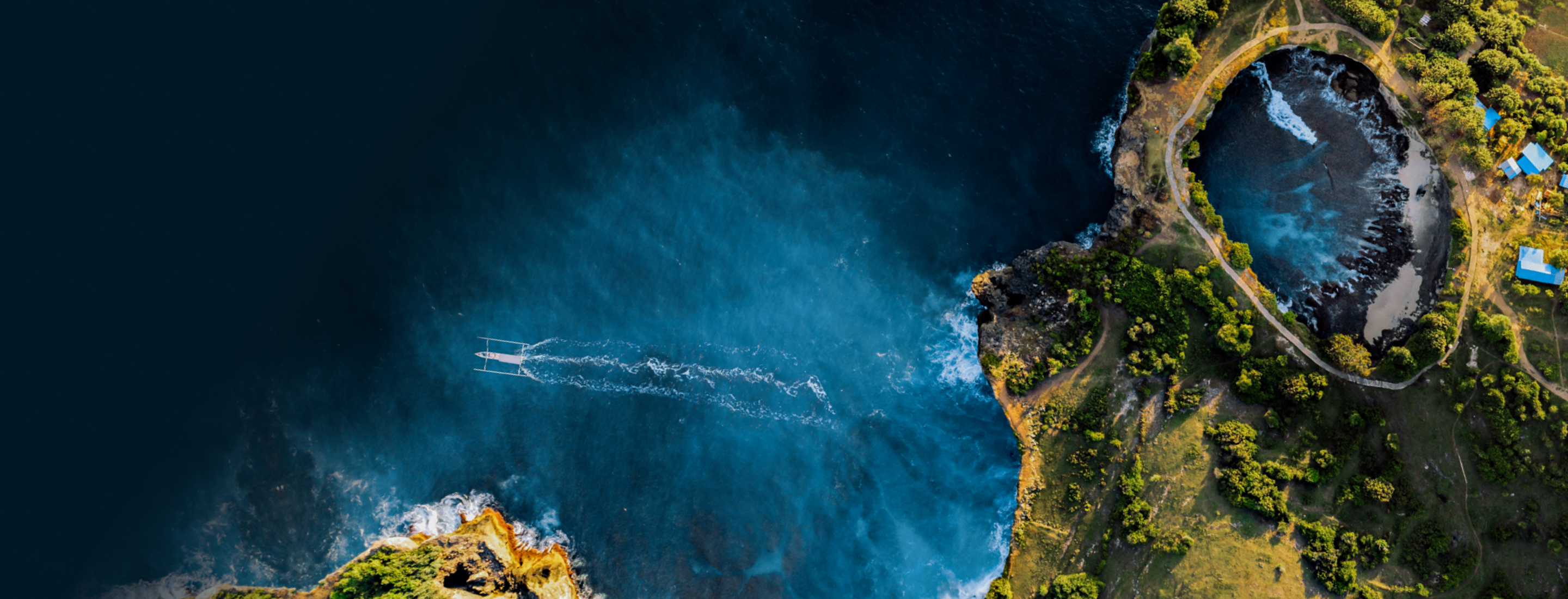 Top-down, aerial view of a scenic coastline.