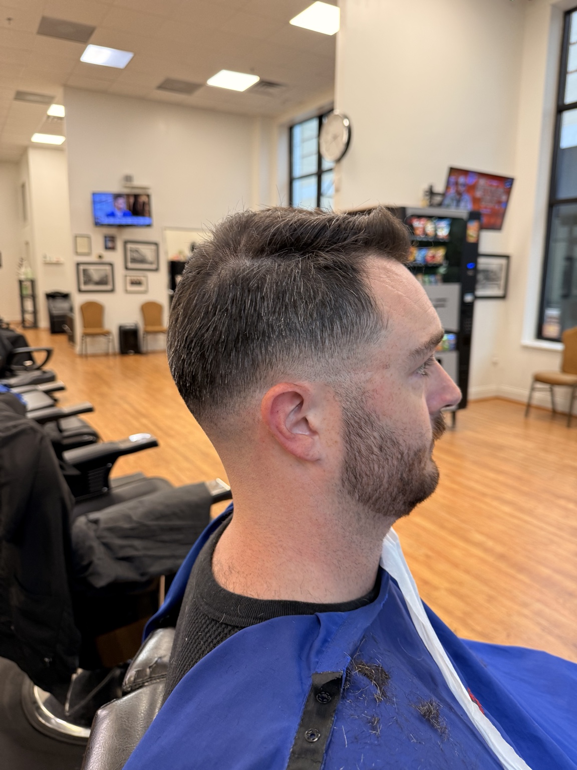 Fade haircut and beard trim at The Ultimate Barber.