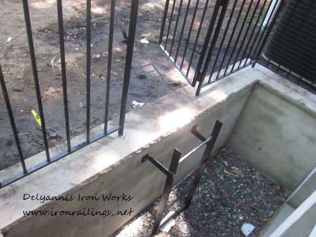 Excape ladder coming us out of basement window well